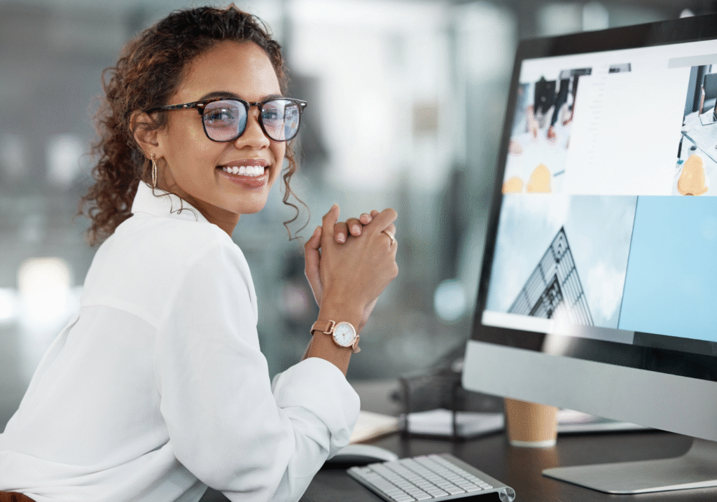 &ldquo;Web designer working on a professional website layout at her desk&rdquo;
