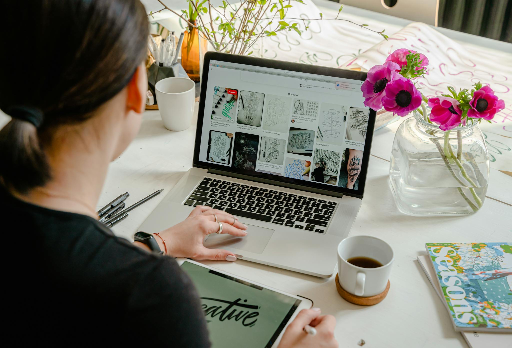 &ldquo;Small business owner reviewing a new website design on a laptop&rdquo;